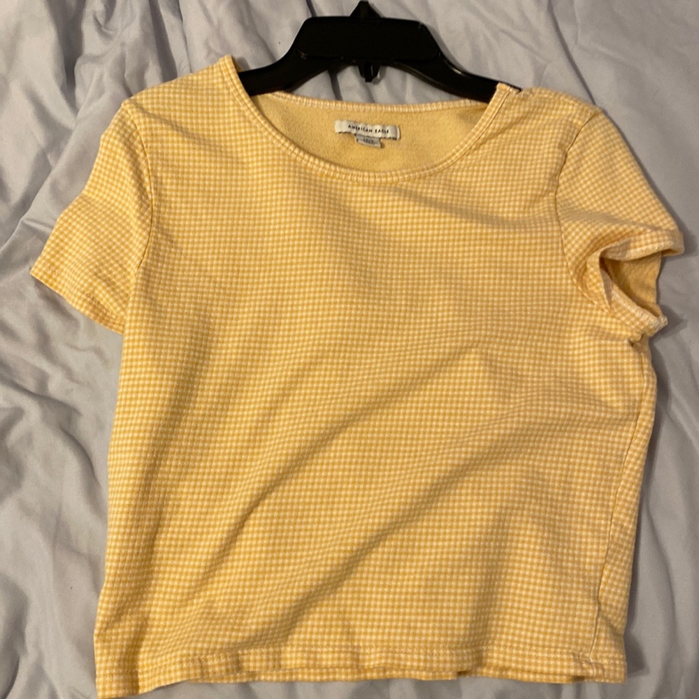 american eagle yellow and white checker top.